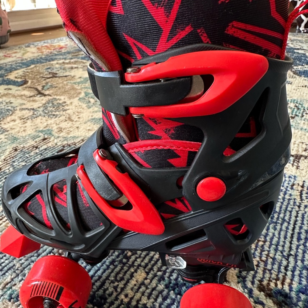 Red and Black Roller Derby Skates